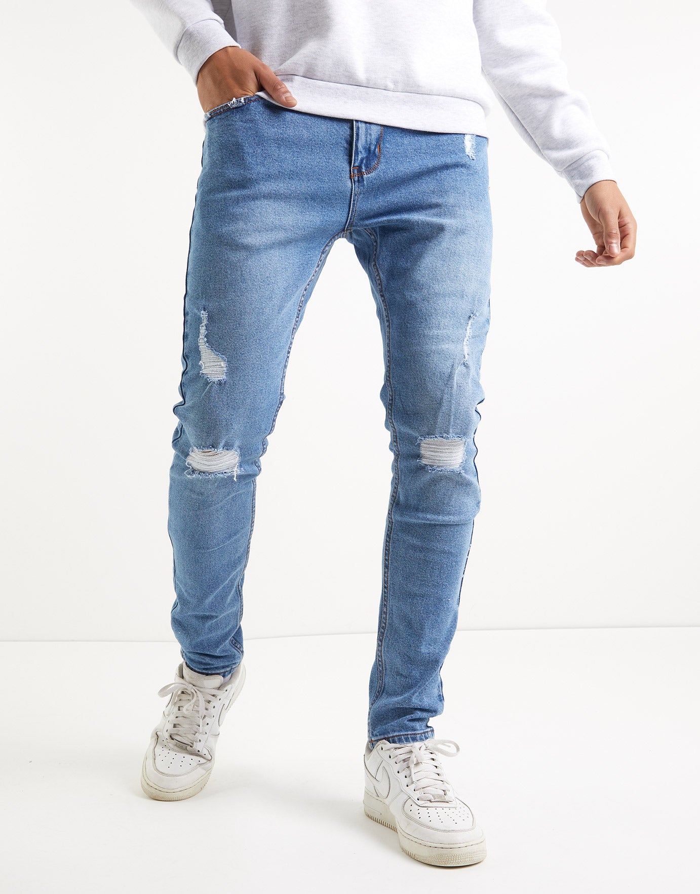 light denim ripped skinny jeans