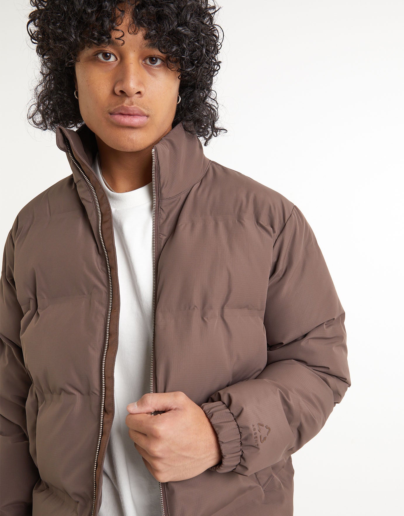 brown puffer jacket