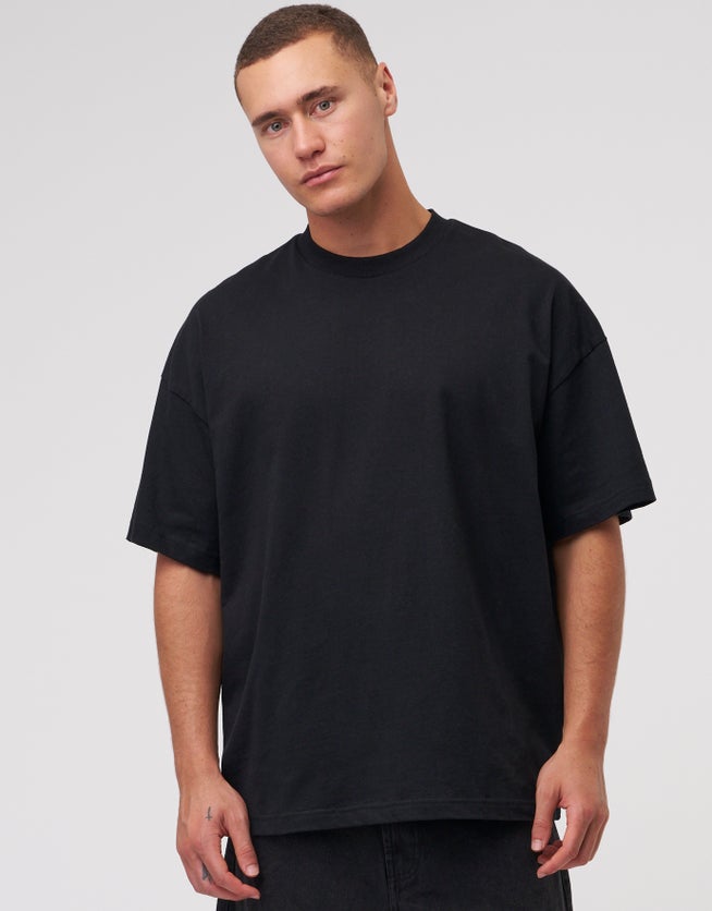 ASOS DESIGN oversized T-shirt in washed black with basketball front print