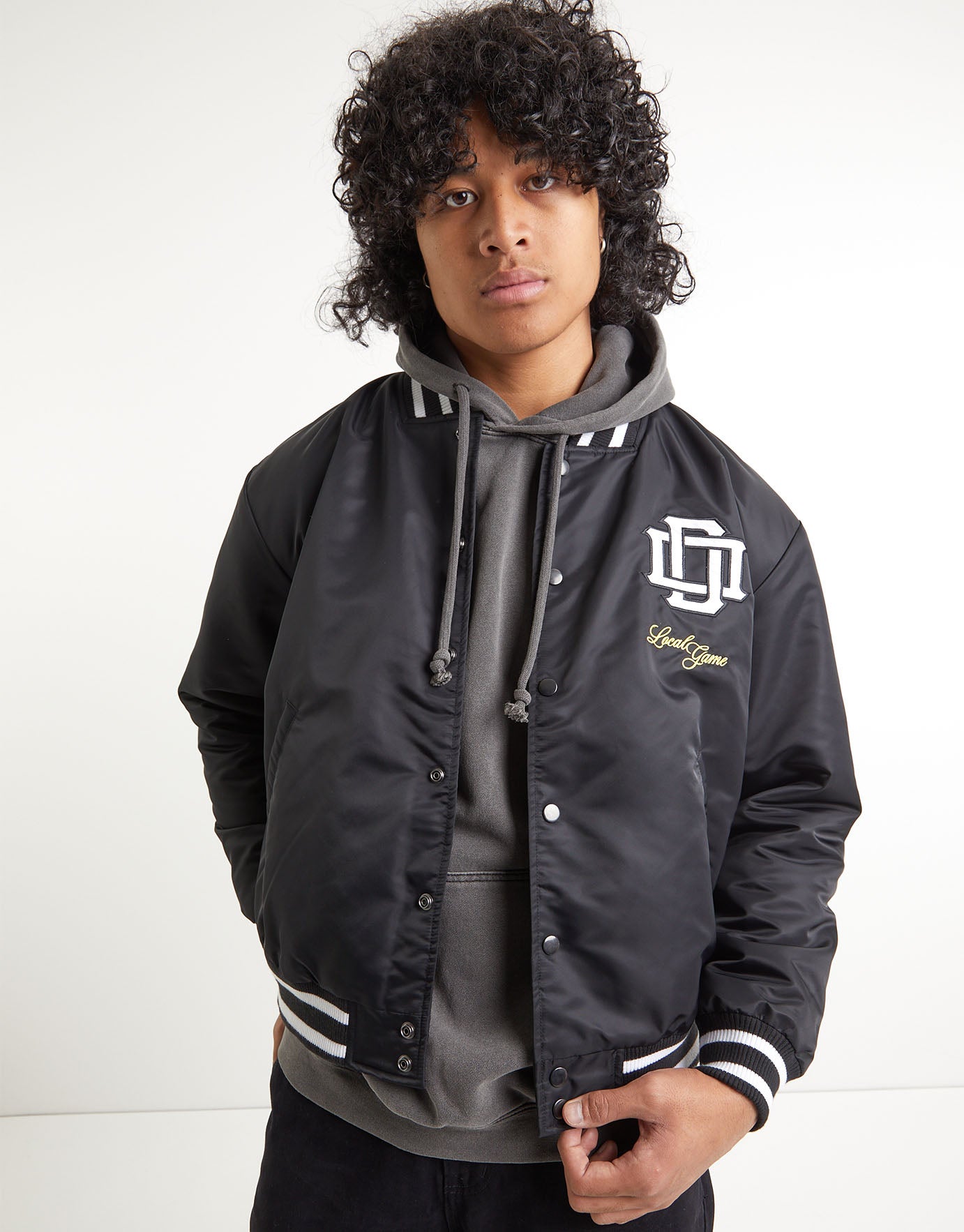 black varsity bomber jacket